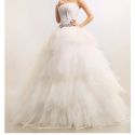 Robe de mariée longue bustier en plumes collection 2015